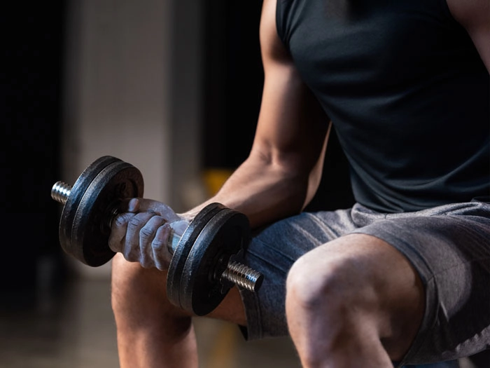 Fitness Mt Sterling KY Man Curling Dumbbells